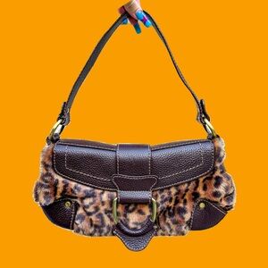 SOLD
Leopard print Valerie Steven’s baguette bag!
